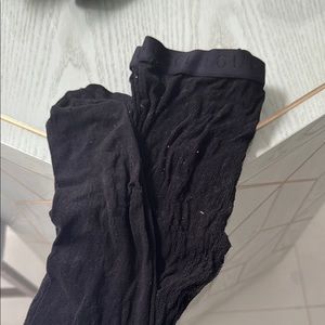 Gucci stockings. 
No rips